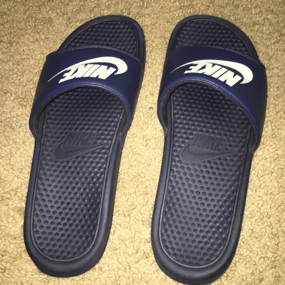 navy blue nike slides